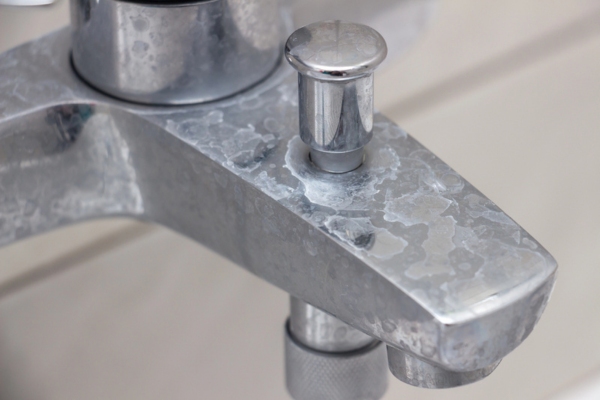 plumbing fixtures with hard water stains