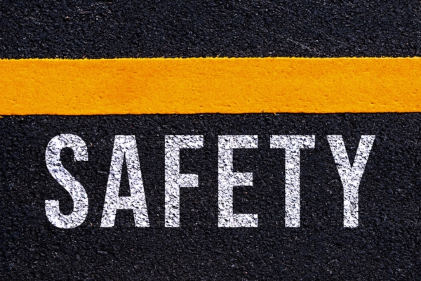safety painted on concrete depicting tankless water heaters