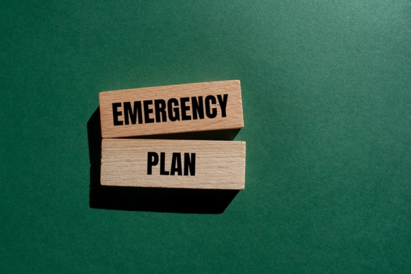 Emergency plan message written on wooden blocks