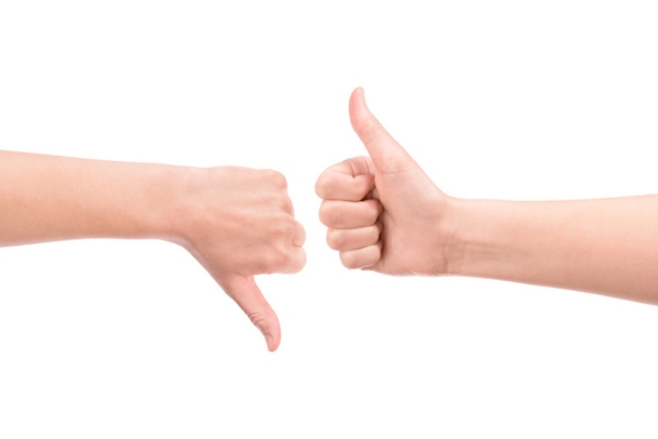 thumbs up and thumbs down depicting advantages and disadvantages