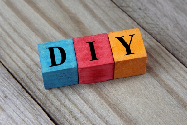 DIY spelled using colorful wooden cubes depicting Tackling Sewer Odors in Your Home