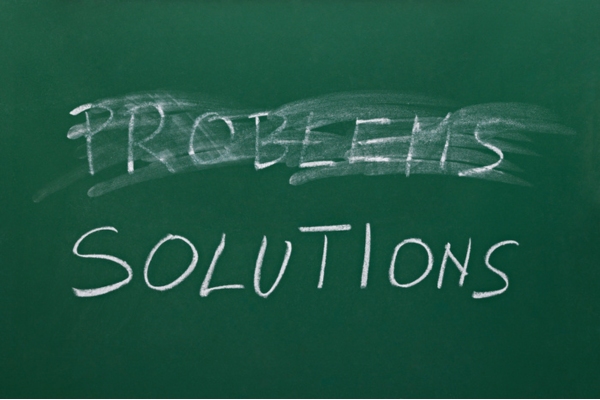 problems solutions written on a chalkboard depicting Tripping Circuit Breakers