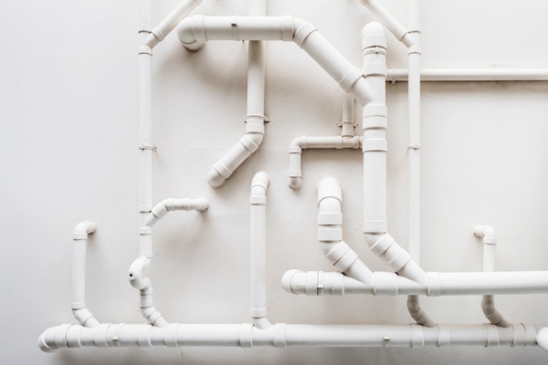 Pipeline Plumbing system on white wall