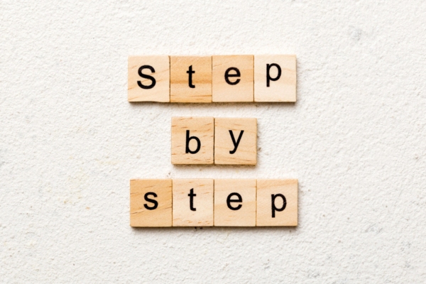 step by step spelled using wooden letter chips depicting Connecting Smart Oil Gauge to Alexa