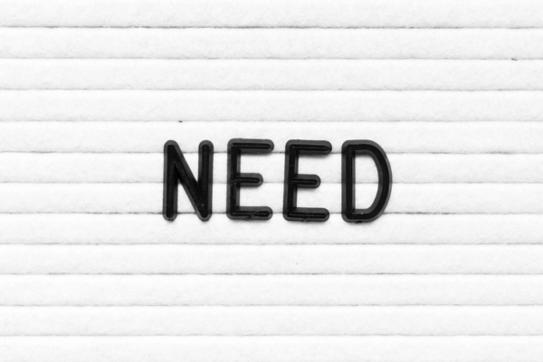 NEED spelled using plastic letters on a felt board depicting Whole-House Surge Protection