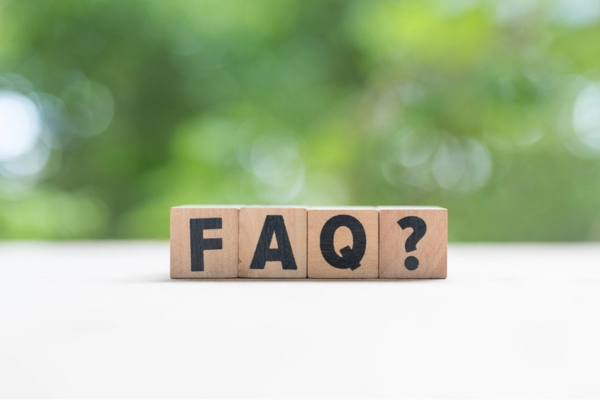 FAQ spelled using wooden letter cubes depicting Home Heating Oil Deliveries questions