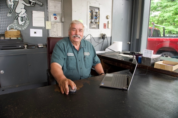 Noonan Energy office worker depicting community commitment and reliability