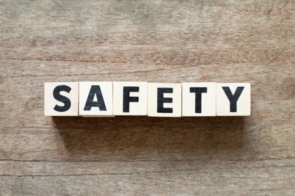 SAFETY spelled using wooden letter cubes