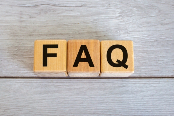 FAQ spelled using wooden letter cubes depicting Heating Oil Delivery Service questions