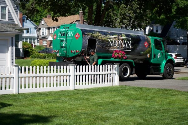 Noonan Energy heating oil delivery service truck and staff