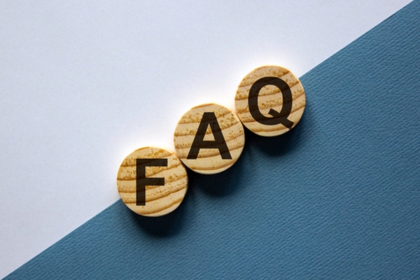 FAQ spelled using circular wooden letter chips depicting Heating Oil Affordability questions