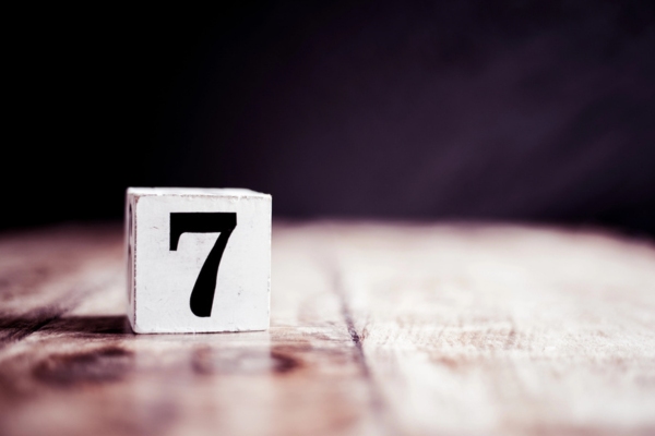 7 written on a wooden cube depicting Common Plumbing Problems in the Summer