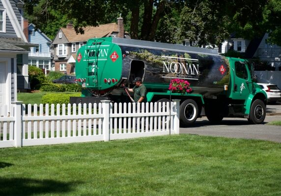 Noonan Energy heating oil delivery service truck and staff