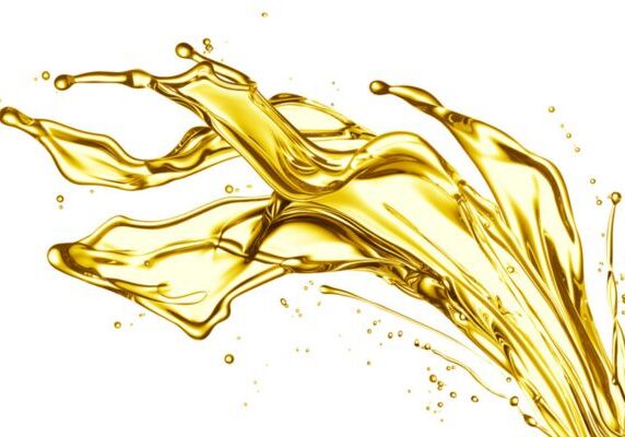 splash of gold liquid depicting heating oil additives